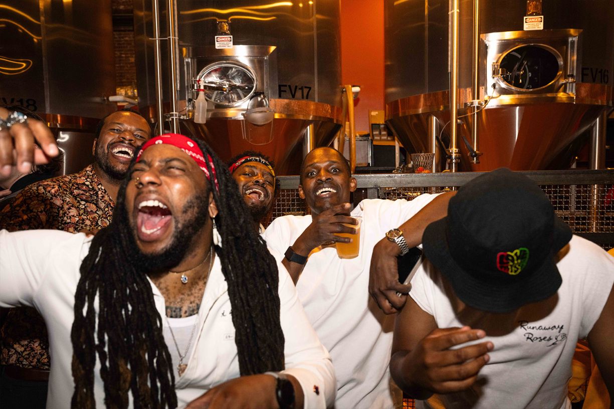 4 men having a good time at an Anti Social Camp event